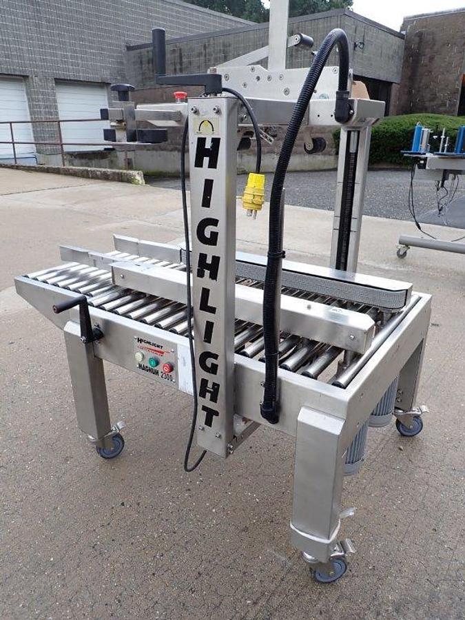 Used Highlight Industries “Magnum 2300-SDU” Stainless Steel Top and Bottom Case Taper