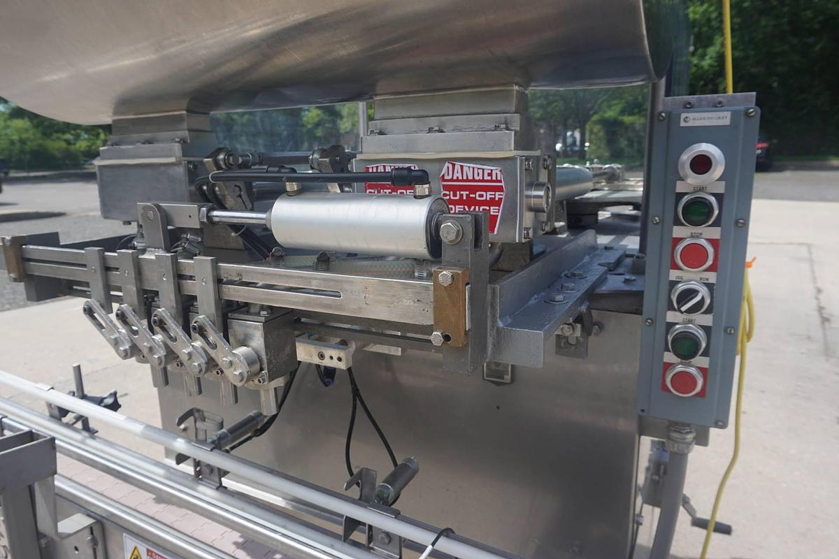 Used Simplex Four Head Automatic Piston Filler