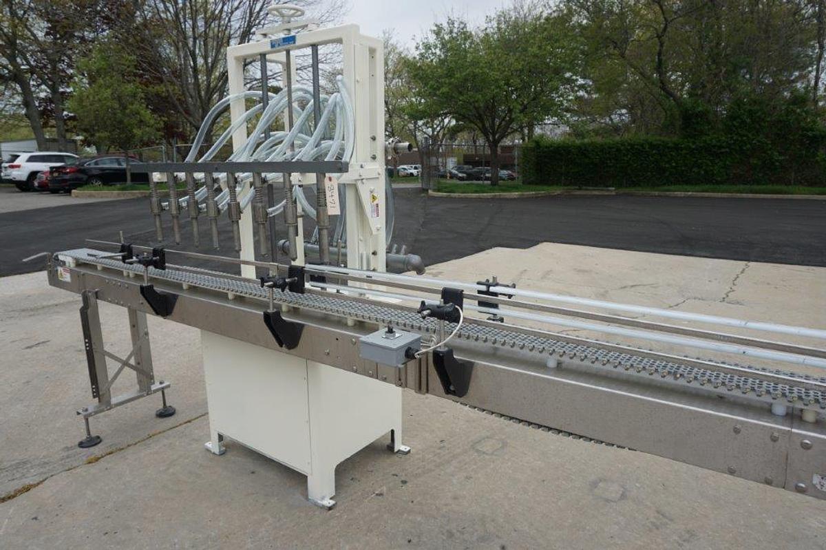 Used RJM 8 Spout Straight Line Liquid Filling Machine, Pressure Gravity Nozzles