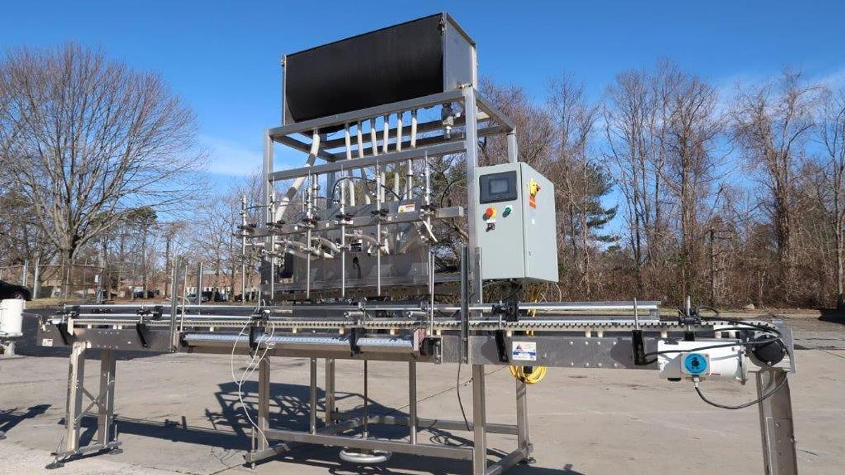 Used Apacks Six Head Automatic Sanitary Pressure Gravity Filling Machine, Expandable