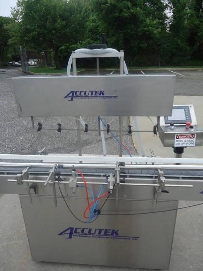 Used Accutek “Auto-Pinch 25” Six-Head Liquid Filler