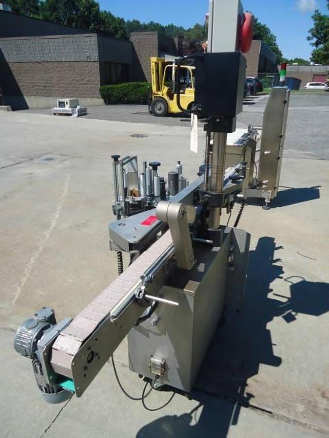 Used Harland “Sirius” Spot/Wrap Around Labeler With Coder