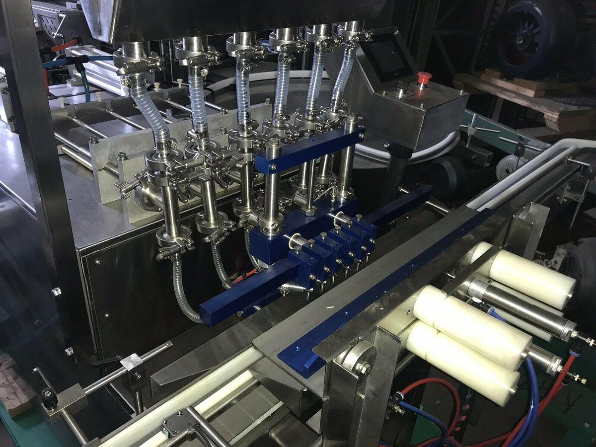 Used Accutek Six Piston Fully Automatic Straightline Filling Machine