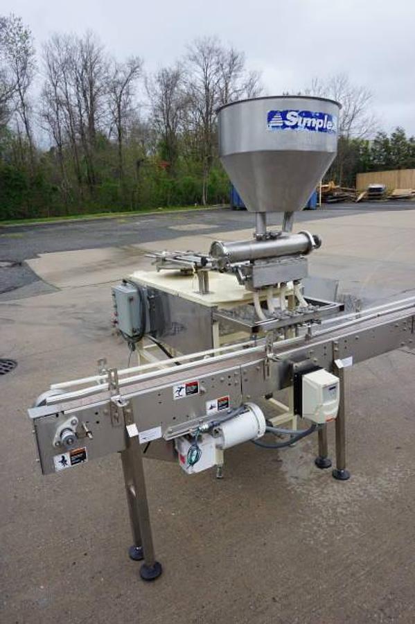 Used Simplex Four Head Piston Filling Machine