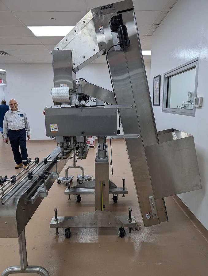 Used Surekap SK6000 Six Spindle Capper, Pharma Use