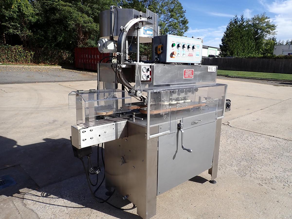 Used Kaps-All Model C Automatic Eight Spindle Capper, 200 Per Minute