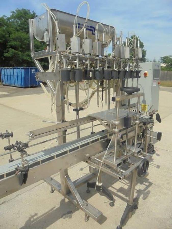 Used Fluid Packaging Solutions 10 Spout SS Gravity Liquid Filler, “Bottom Up” Fill