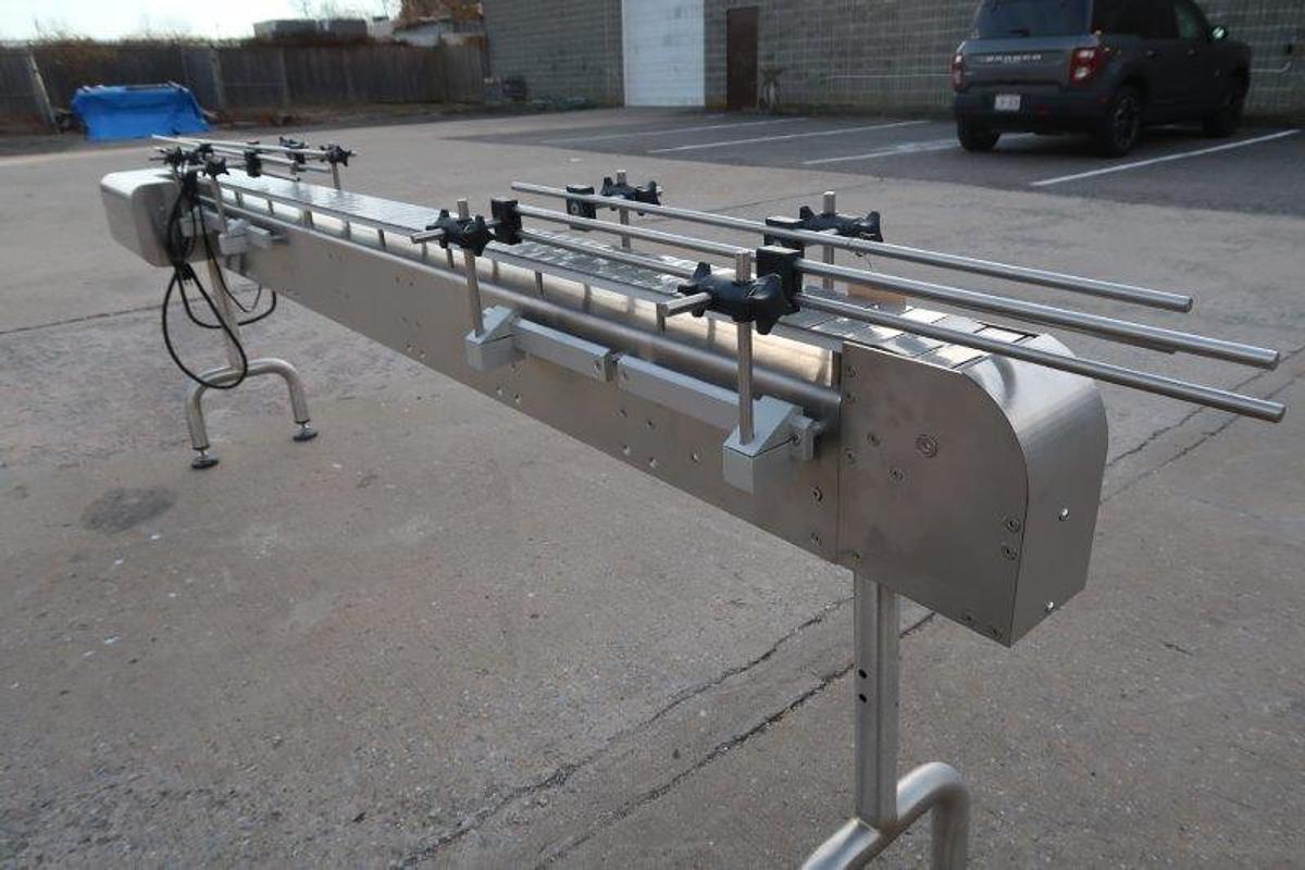 Used 4.5 In. x 9 Ft. SS Motorized Bottle Conveyor, Variable Speed
