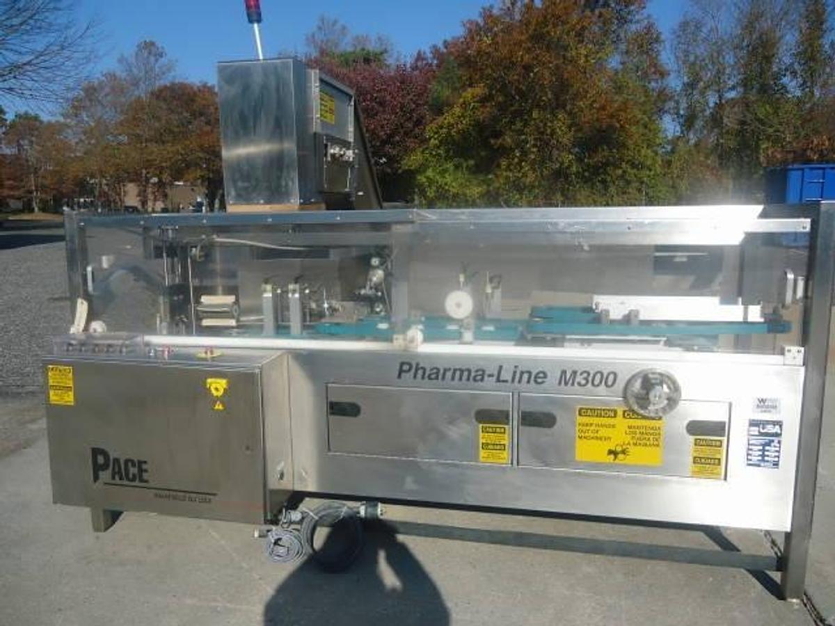 Used PACE PHARMA-LINE M300 STAINLESS STEEL PLASTIC BOTTLE UNSCRAMBLER WITH ELEVATOR