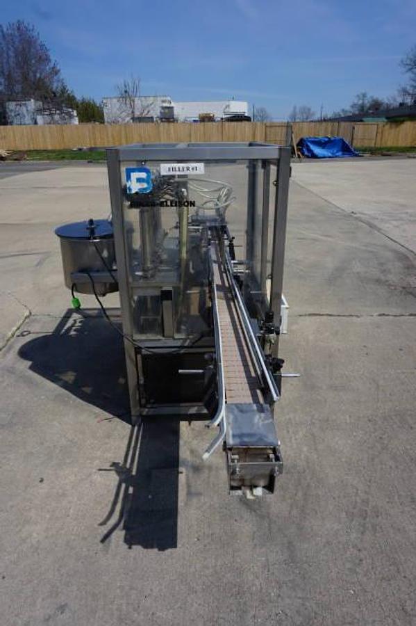 Used Biner Ellison Six Head Straight Line Piston Filling Machine
