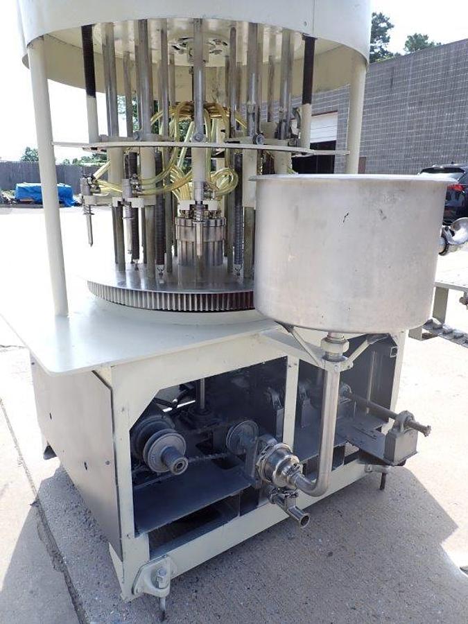 Used New Way 12 Spout Rotary Pressure Gravity Liquid Filling Machine, 8-1/4 In. Centers