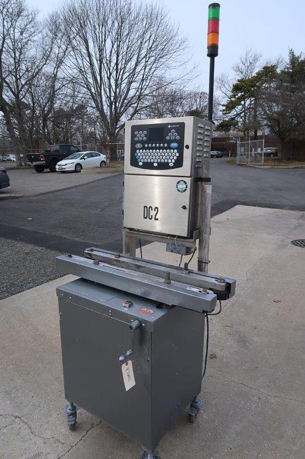 Used Domino A100 Inkjet Printer, Mounted on Bottomless Conveyor/Gap Transporter