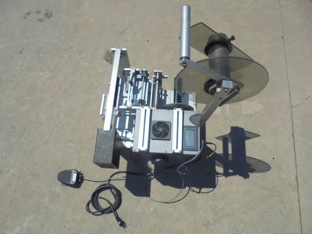 Used Universal R310 Tabletop Semi-Auto Pressure Sensitive Spot/Wraparound Labeler