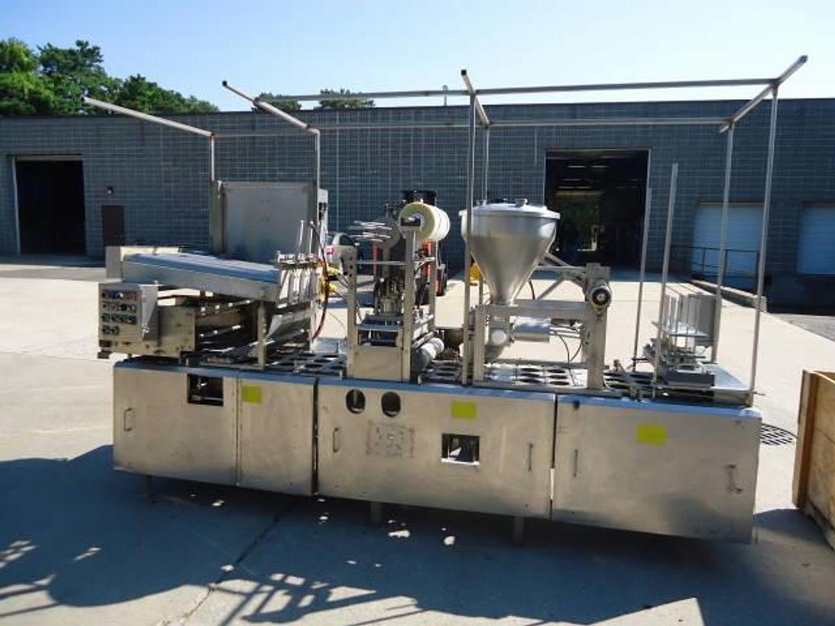 Used Modern Packaging Three Lane Cup Filler/Sealer/Lidder , Stainless Steel
