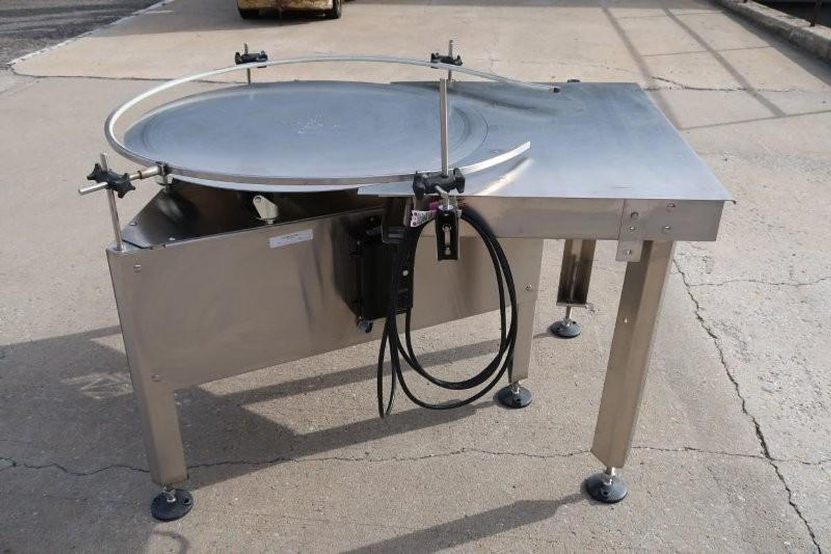 Used Oden 36 In. Diameter Rotary Unscrambling/Accumulating Table, with Shelf
