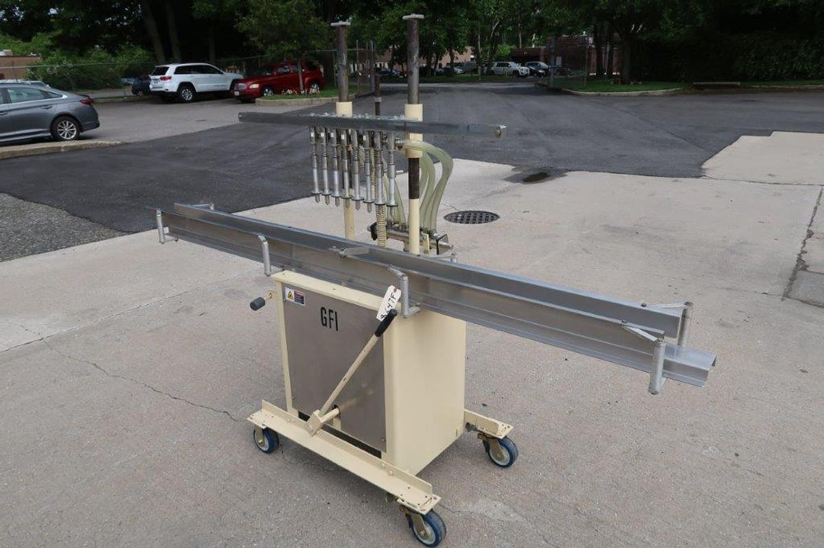 Used 8 Spout Semi-Automatic Liquid Filler, Portable
