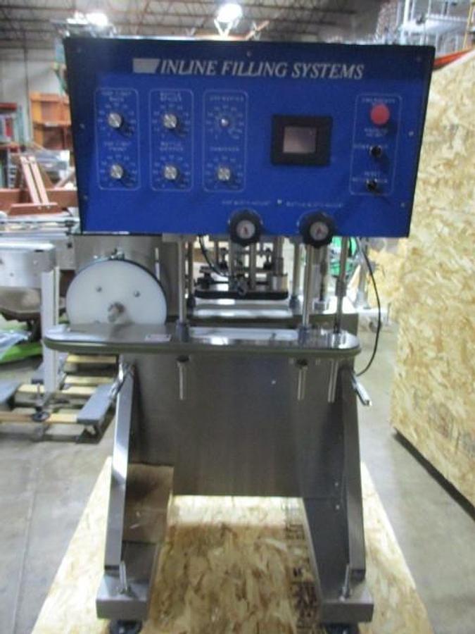 Used Inline Filling Systems Overflow Filling Line, with Capper