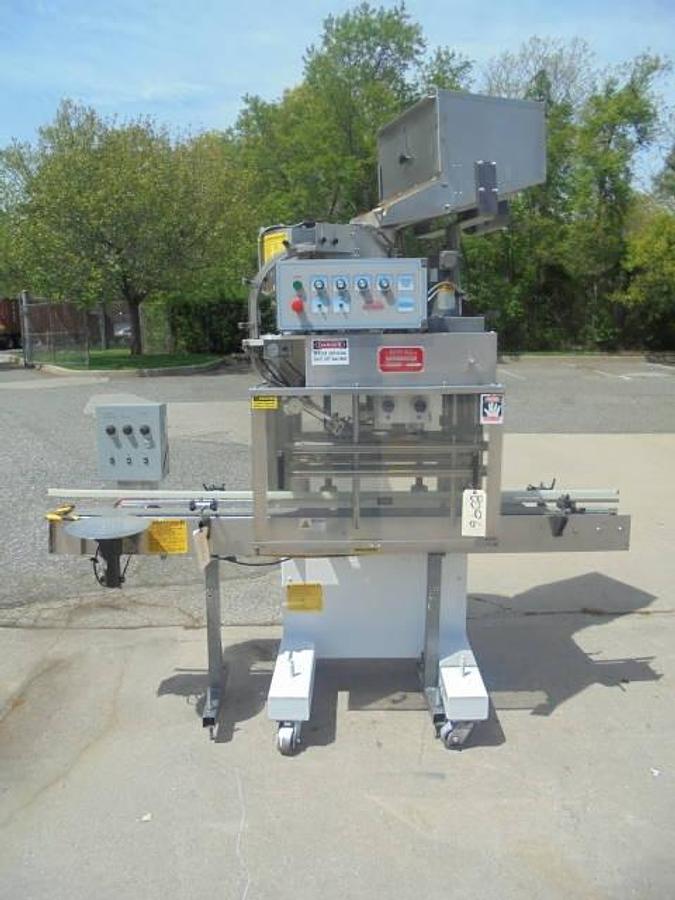 Used Kaps All E4 Four Spindle Automatic Screw Capper, 80 Per Minute