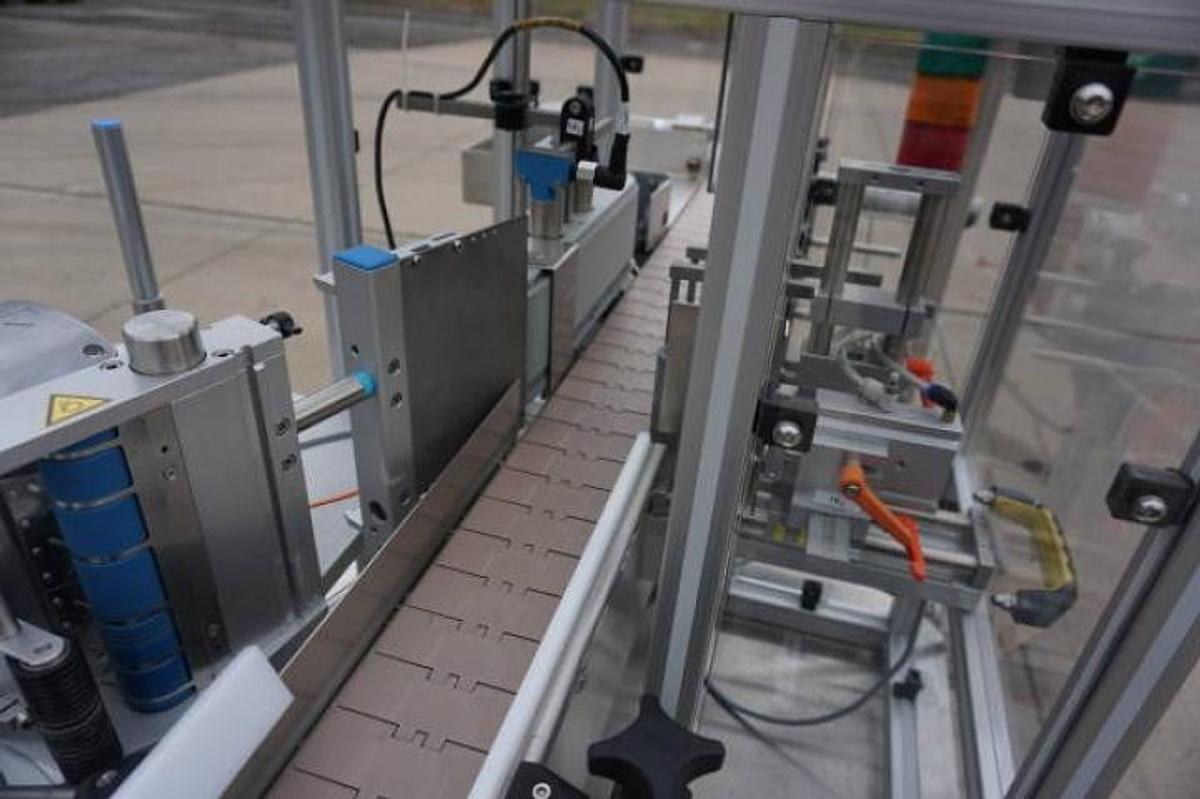 Used Aesus Systems “Eco Wrap Prism” Automatic Pressure Sensitive Spot/Wrap Around Labeler, Stainless Steel