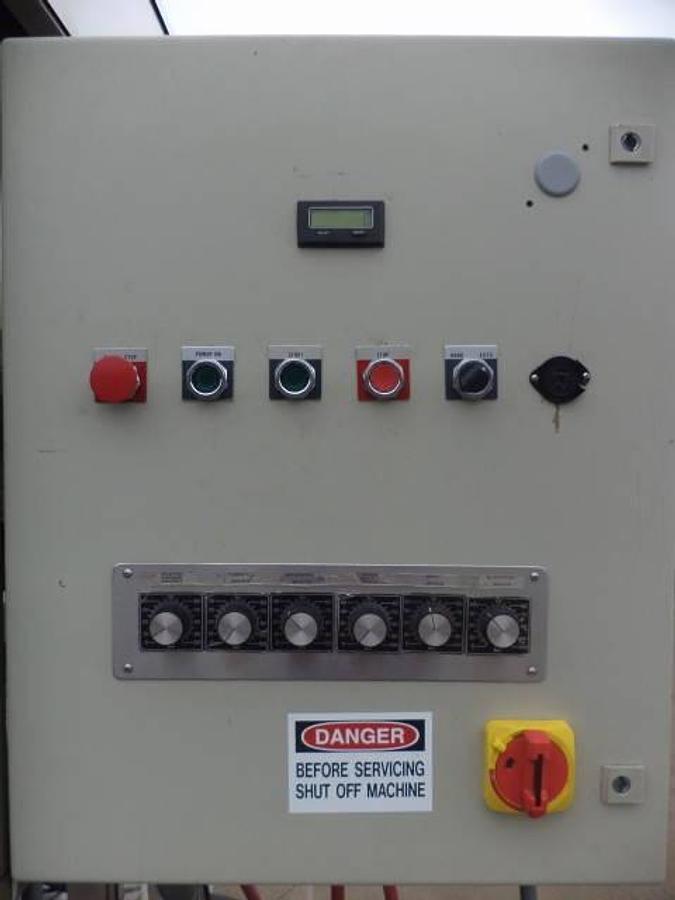 Used New England Machinery Ten Head Rotary Capper With  Feeder/Unscrambler