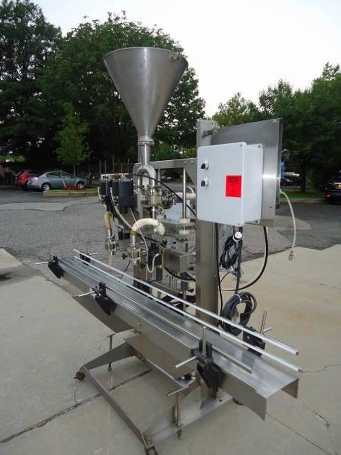 Used E-Pack Pneumatic Two Head Piston Filler