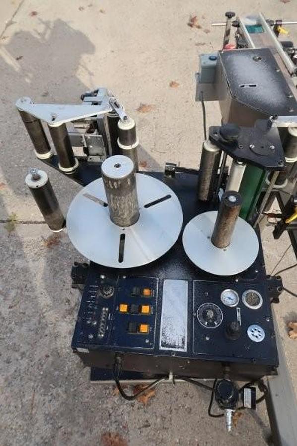 Used LSI Auto Pressure Sensitive Wraparound Labeler with Coder