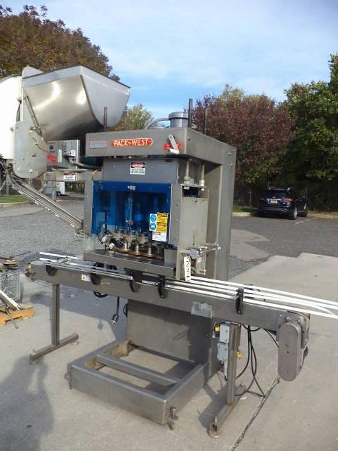 Used Pack West eight spindle inline automatic capper