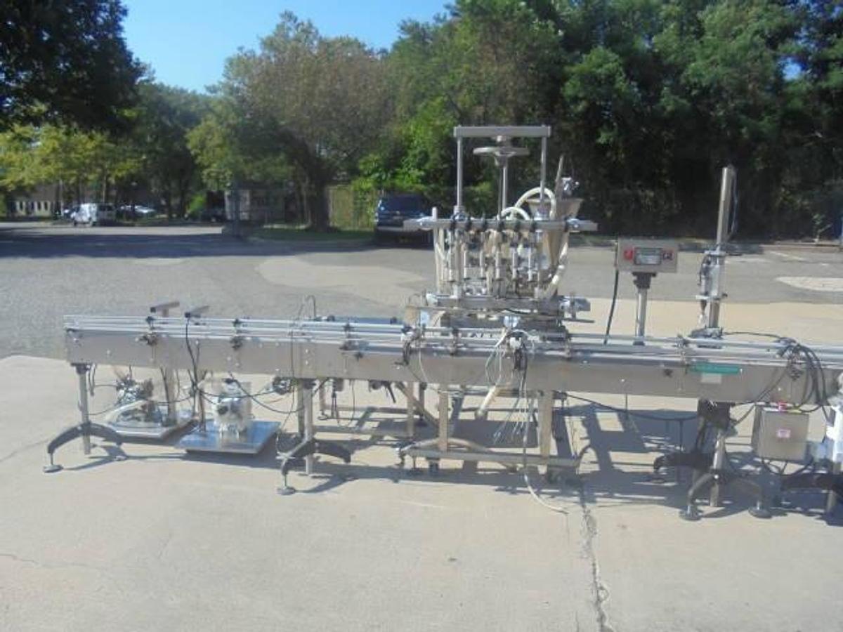 Used Inline Filling Systems “Servo” Six Nozzle Positive Displacement Pump Style Filler