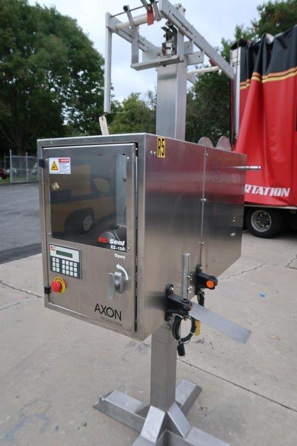 Used Axon EZ-130 SS Heat Shrink Sleever/Bander, 150 per Minute