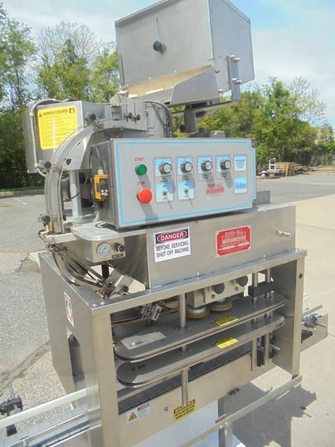 Used Kaps All E4 Four Spindle Automatic Screw Capper, 80 Per Minute