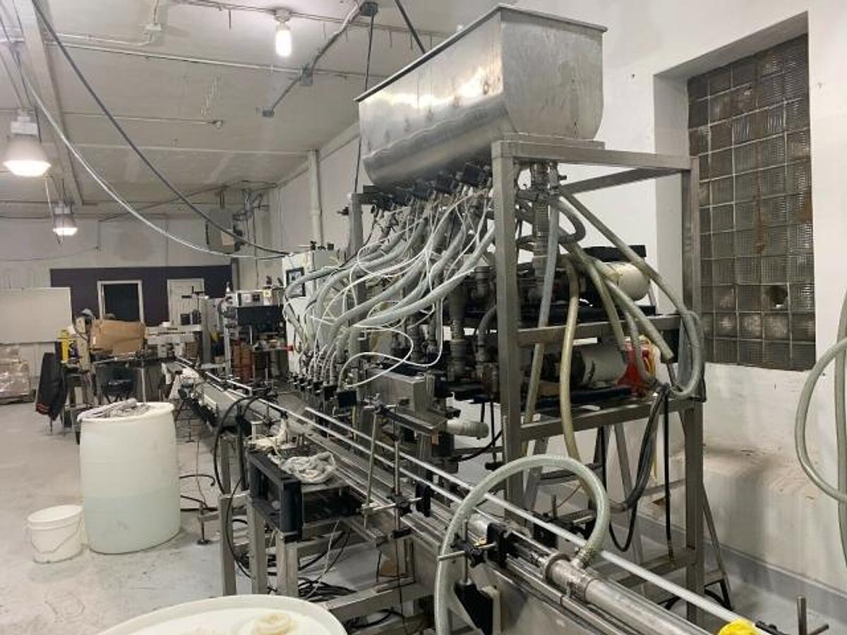 Used E-Pak Six Head Fully Automatic Pump Style Positive Displacement Filling Machine