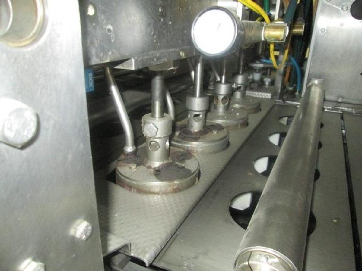 Used BWI Holmatic Opti-Fil four lane cup filling line