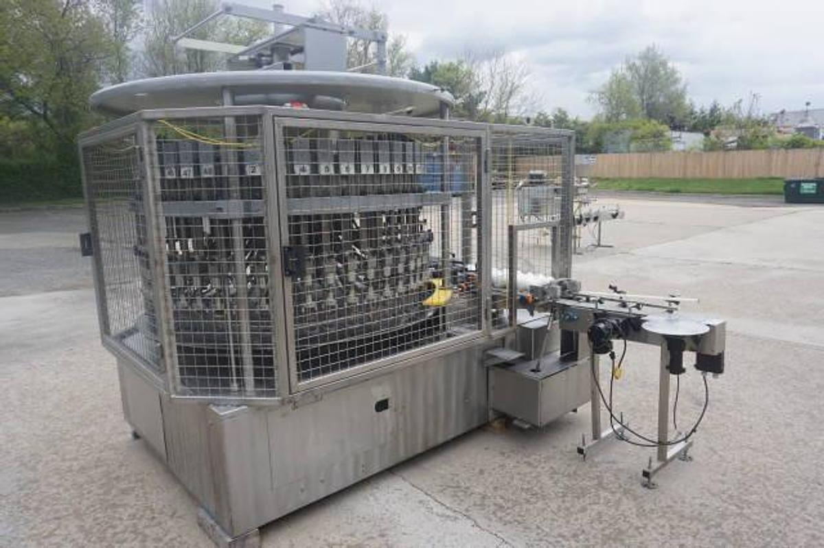 Used U.S. Bottlers 48 Valve Rotary Gravity Filling Machine, Last Filling Alcohol