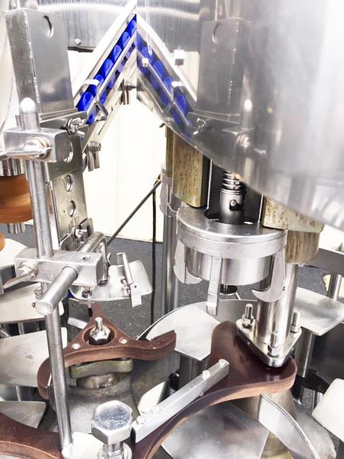 Used Fogg 18 Valve Bottle Filler with 4-Head Screw Capper