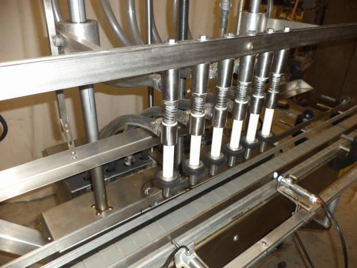 Used Kaps-All/Filz-All Automatic Gravity Overflow Liquid Filler