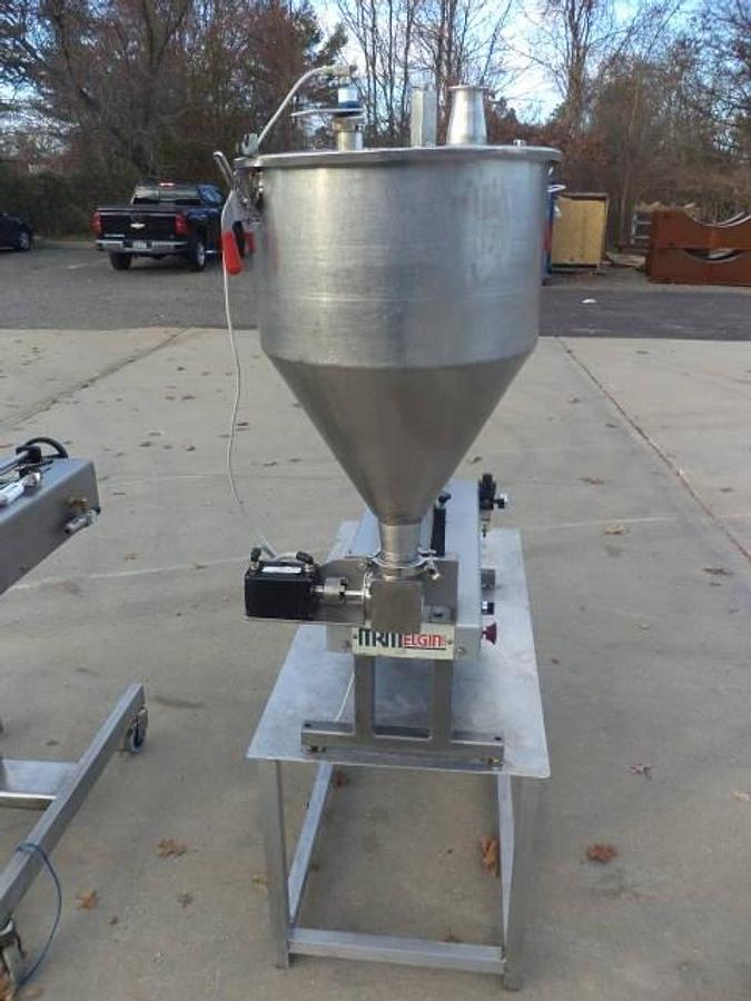 Used MRM/ELGIN Single Piston Air Operatd Filler, 60 Oz. Maxiumu Fill
