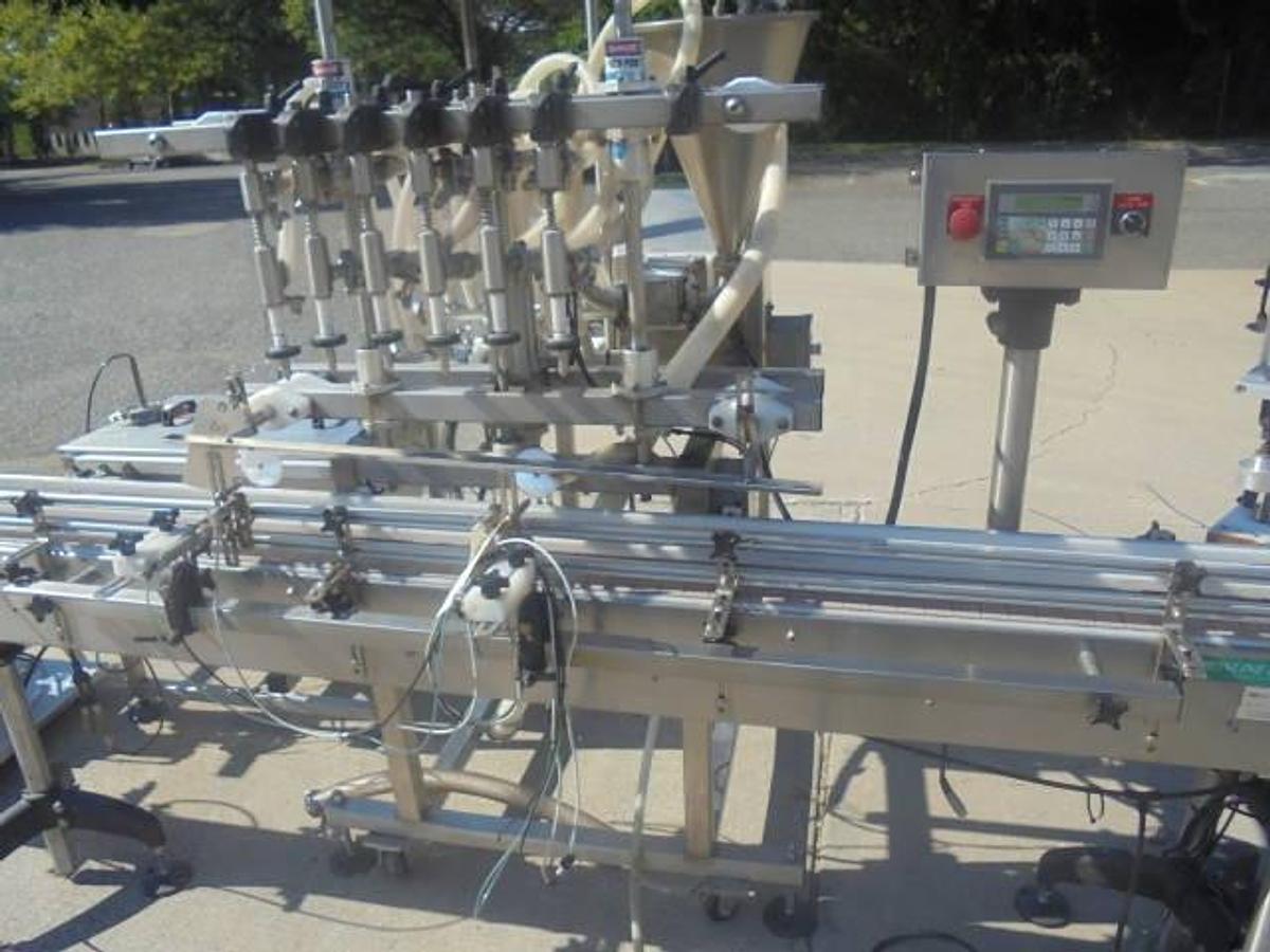 Used Inline Filling Systems “Servo” Six Nozzle Positive Displacement Pump Style Filler