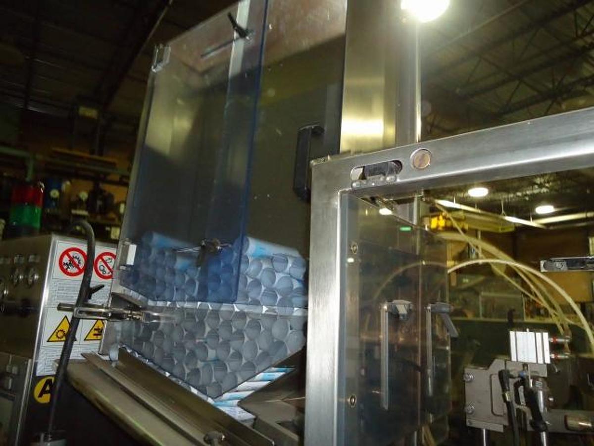 Used Unipac 120 Automatic Plastic Tube Filling/Sealing Machine