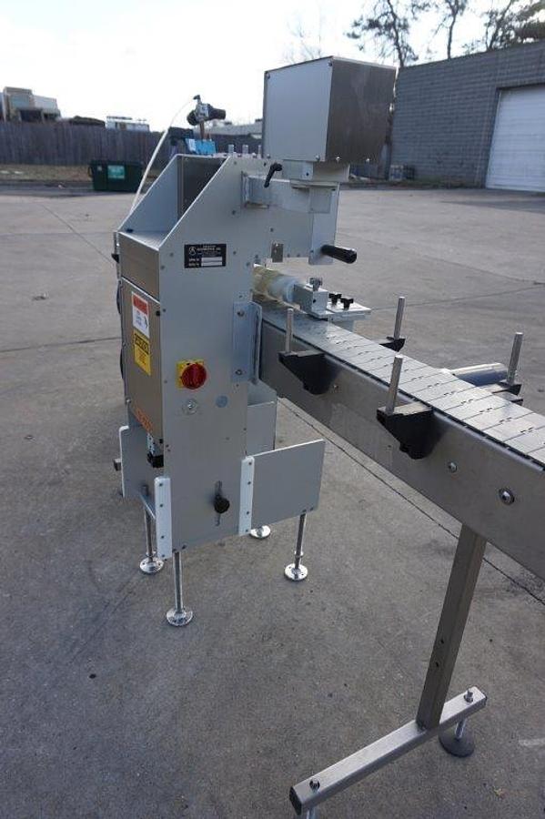 Used Creative Automation 401 Outserter, with Nordson Gluer