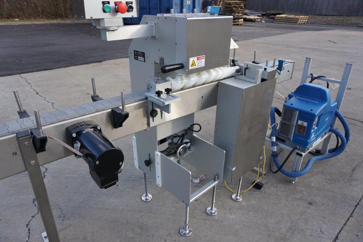 Used Creative Automation 401 Outserter, with Nordson Gluer