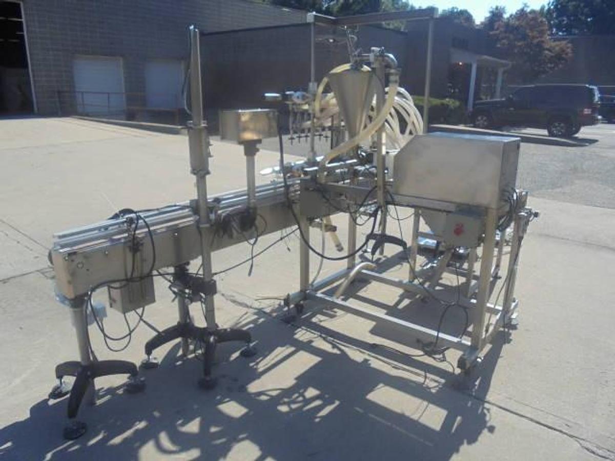 Used Inline Filling Systems “Servo” Six Nozzle Positive Displacement Pump Style Filler