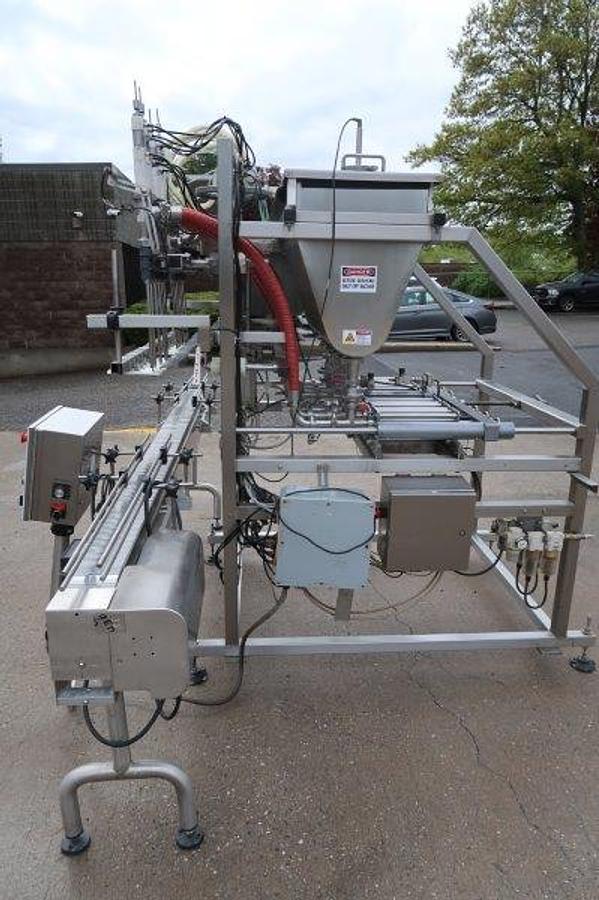 Used Inline Filling Systems Six Piston Hot Filler, Air Rinser