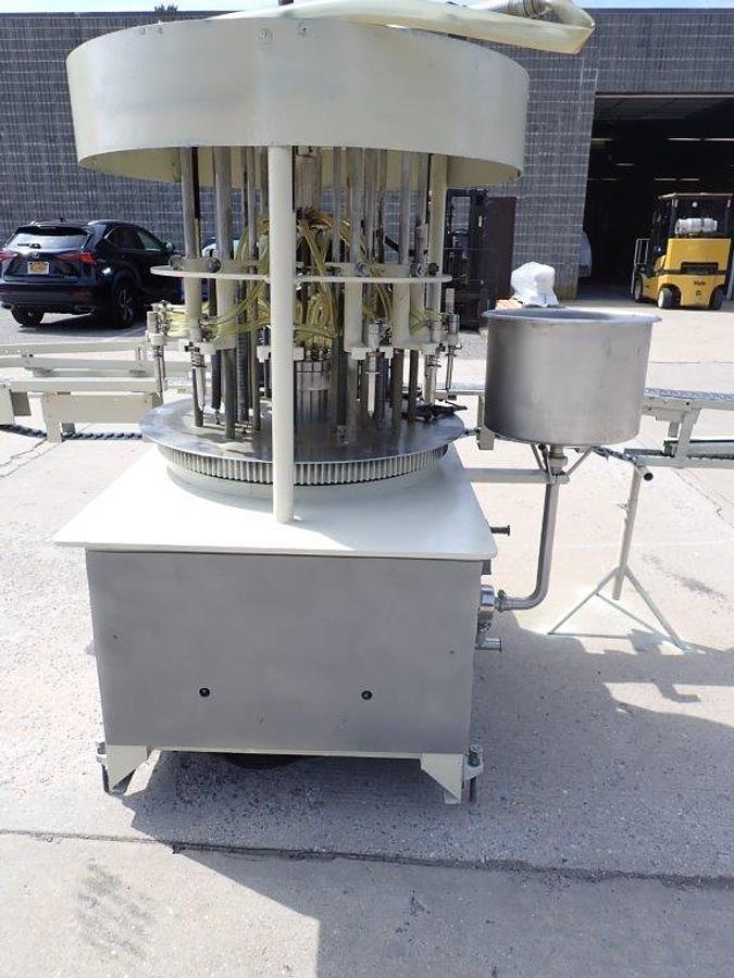 Used New Way 12 Spout Rotary Pressure Gravity Liquid Filling Machine, 8-1/4 In. Centers