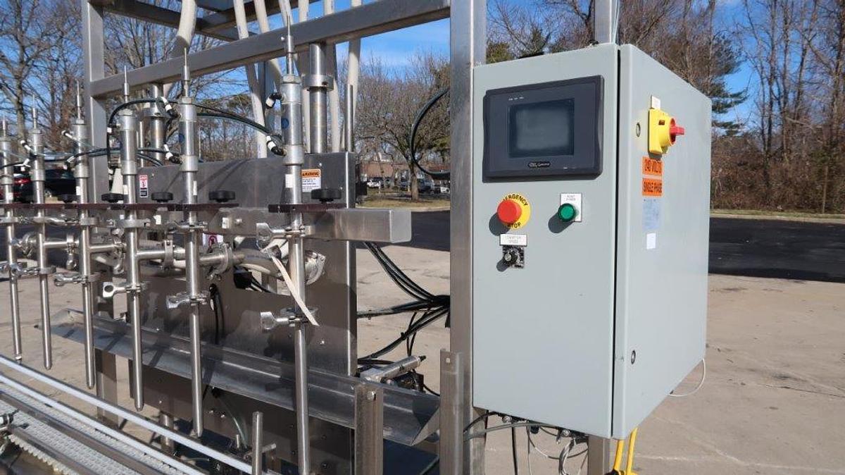 Used Apacks Six Head Automatic Sanitary Pressure Gravity Filling Machine, Expandable