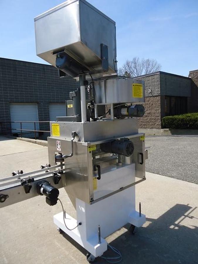 Used Kaps-All E4 Four Spindle Automatic Screw Capper, 80 Per Minute
