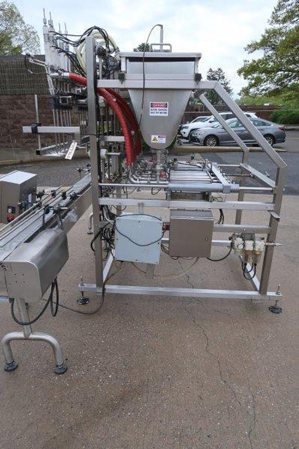 Used Inline Filling Systems Six Piston Hot Filler, Air Rinser