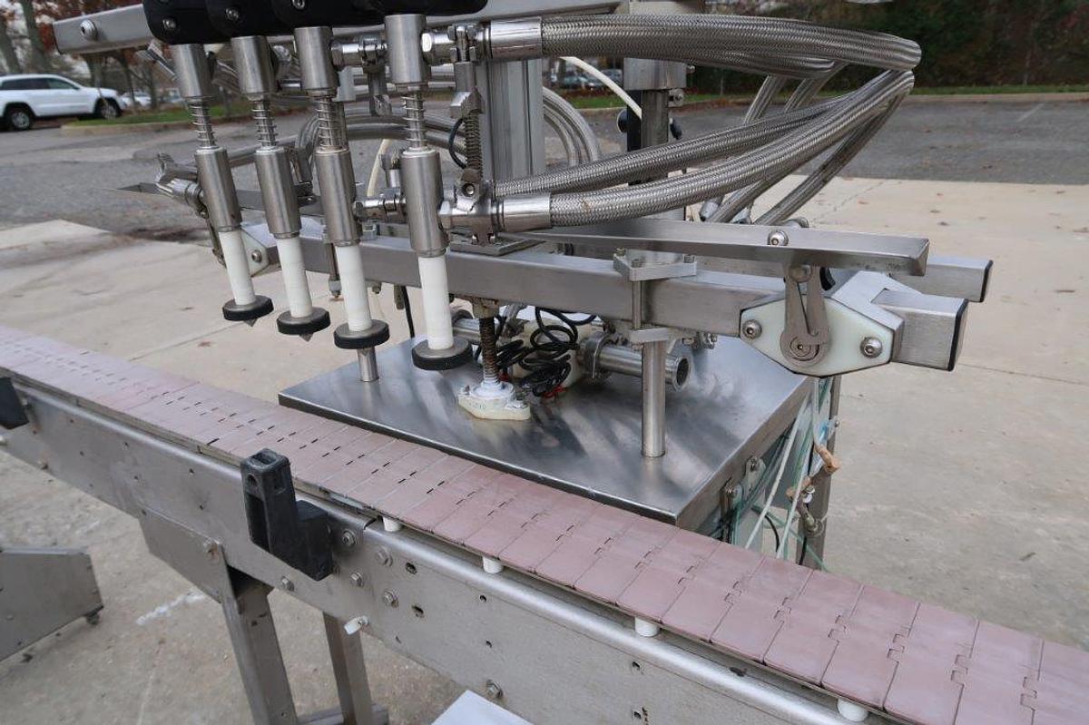 Used Inline Filling Systems 4 Spout Overflow Straight Line Liquid Filler, Stainless Steel