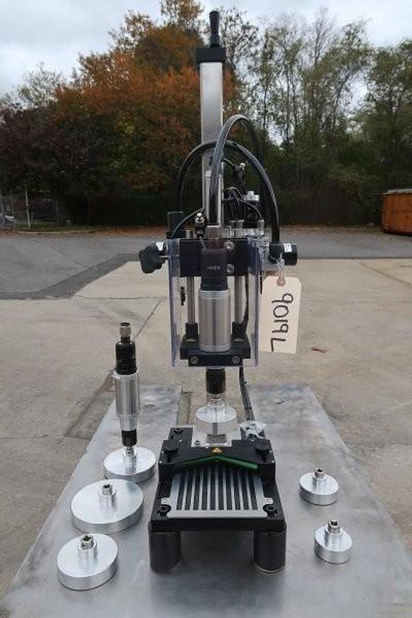 Used Kinex Air Operated Chuck Style Capper with Bench Top Table