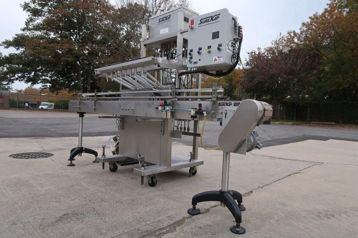 Used Surekap 8 Head Inline Auto Piston Filler, Explosion Proof