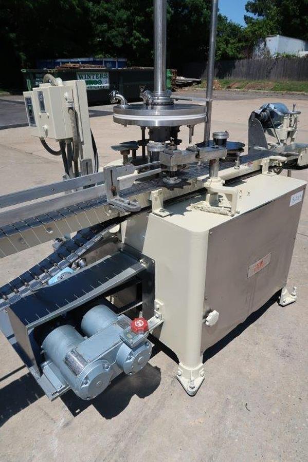 Used MRM “Versa-Fil” Six Head Rotary Time and Pressure Positive Displacement Filling Machine, with Waukesha Pump